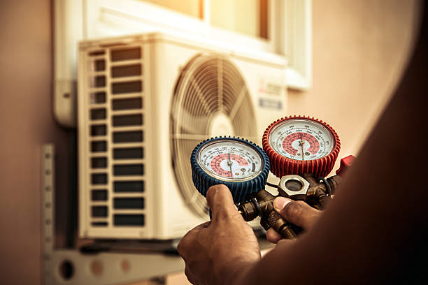 Professional Ac Installation technician working in Fayette City, PA